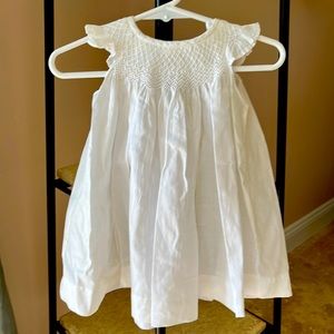 Feather Baby 100% Pima Cotton smocked dress with button up fastening  6-12 mths